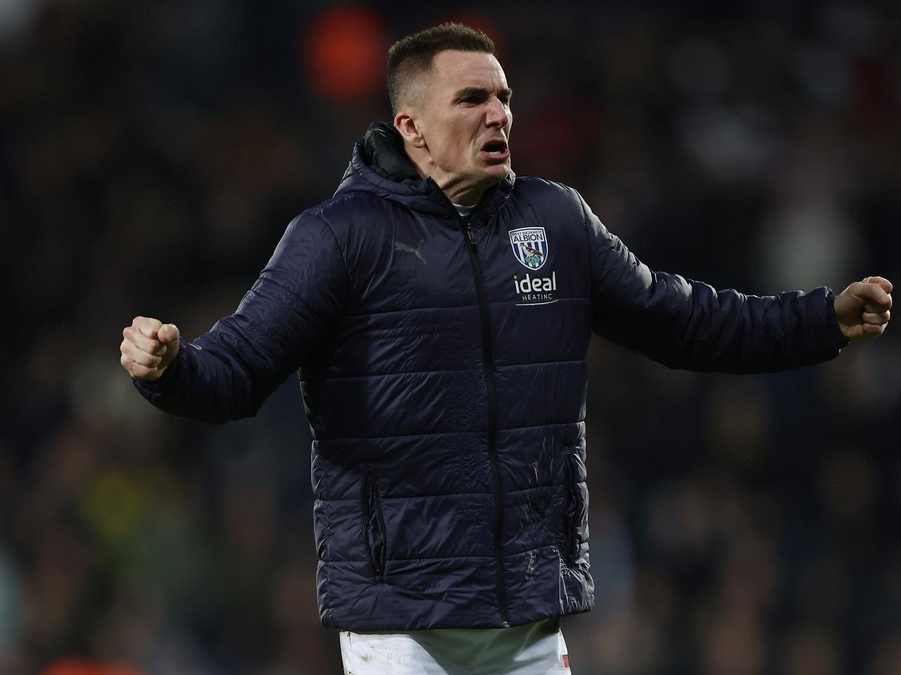 Jed Wallace celebrates victory after the final whistle