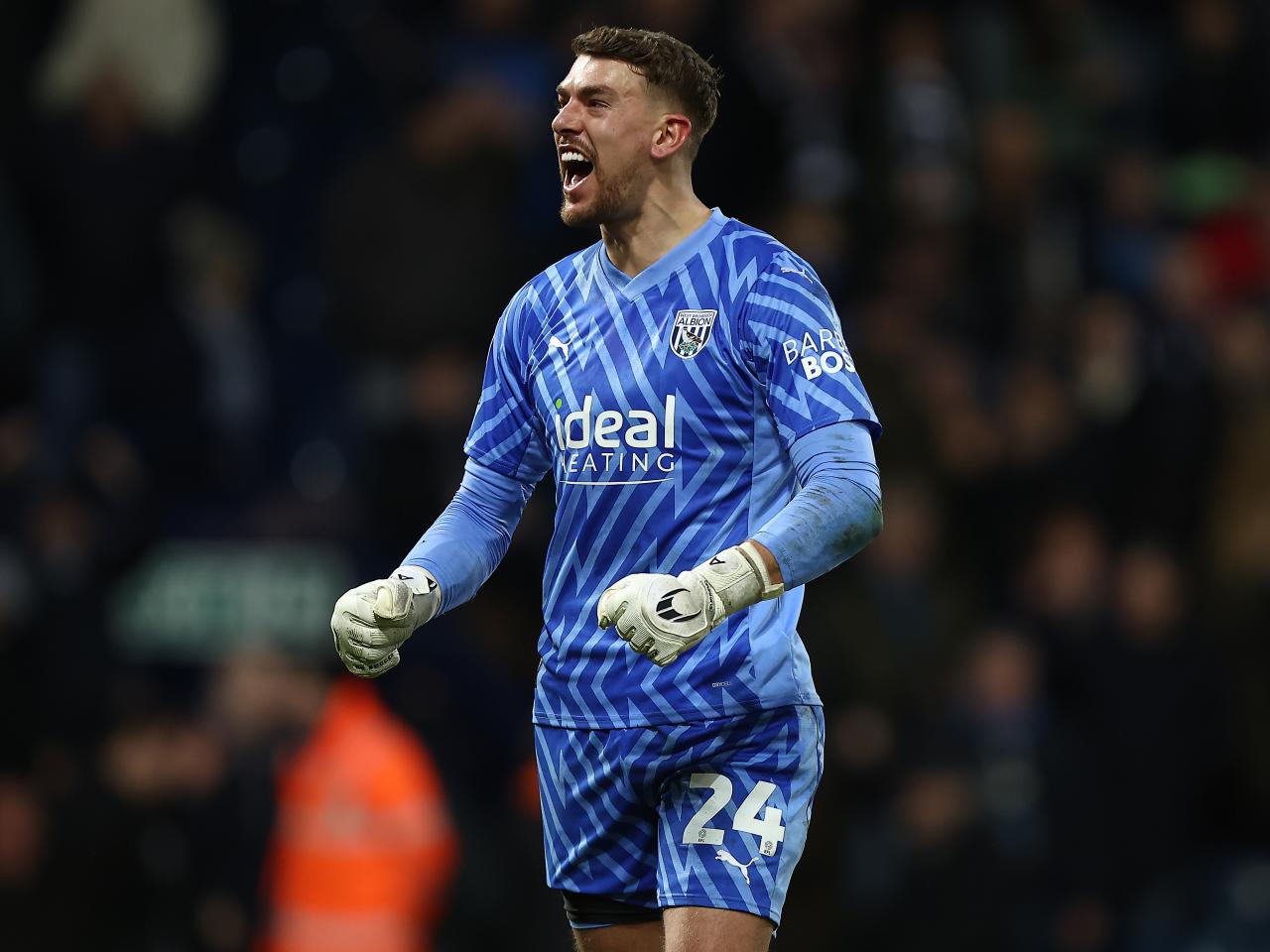 Alex Palmer celebrates victory after the final whistle