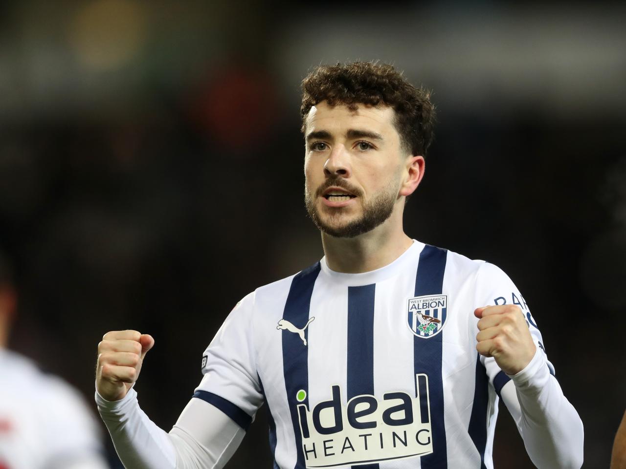 Mikey Johnston with his fists clenched after scoring against Coventry 