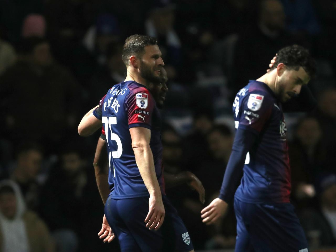 Grady Diangana celebrates scoring a goal against QPR with Erik Pieters