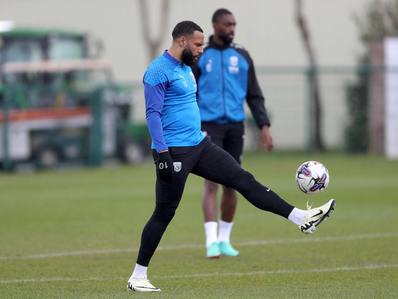 Matty Phillips juggling a football during a training session