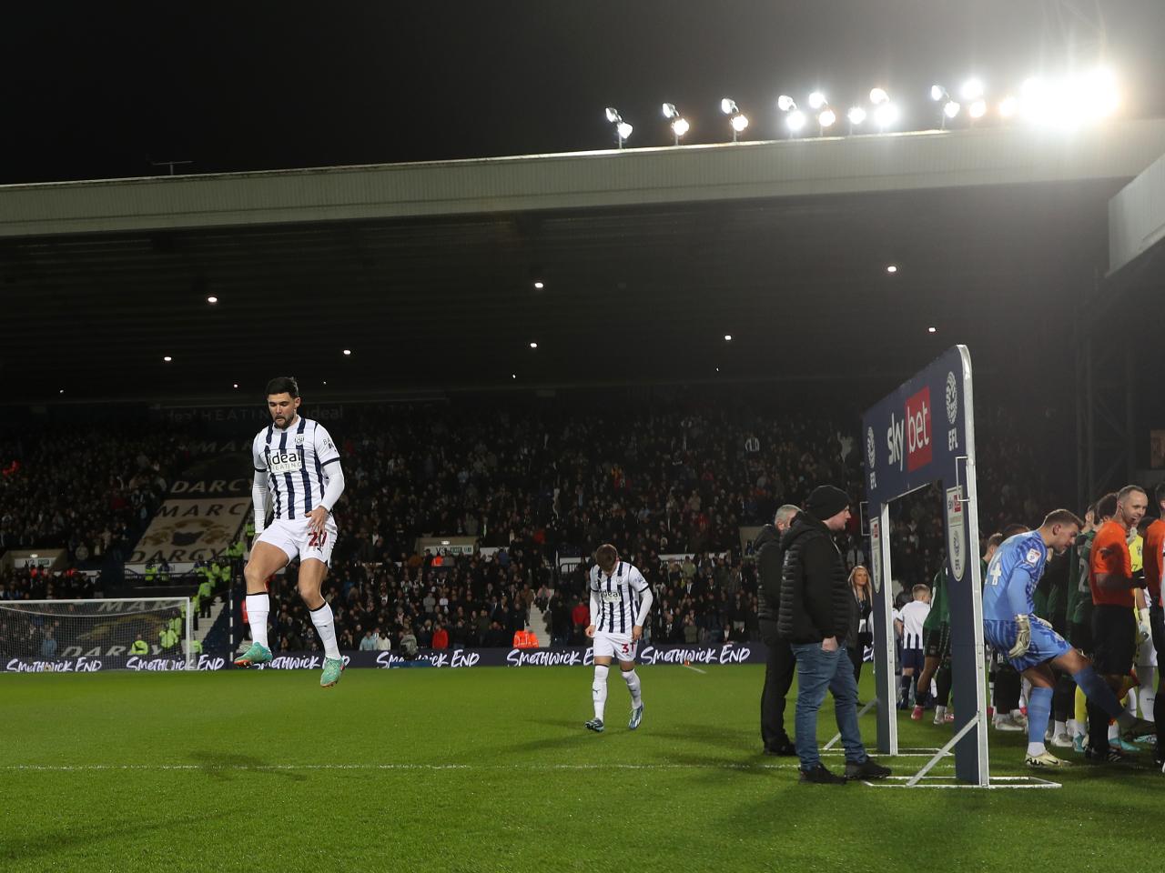 Alex Mowatt jumping in the air before the Coventry game