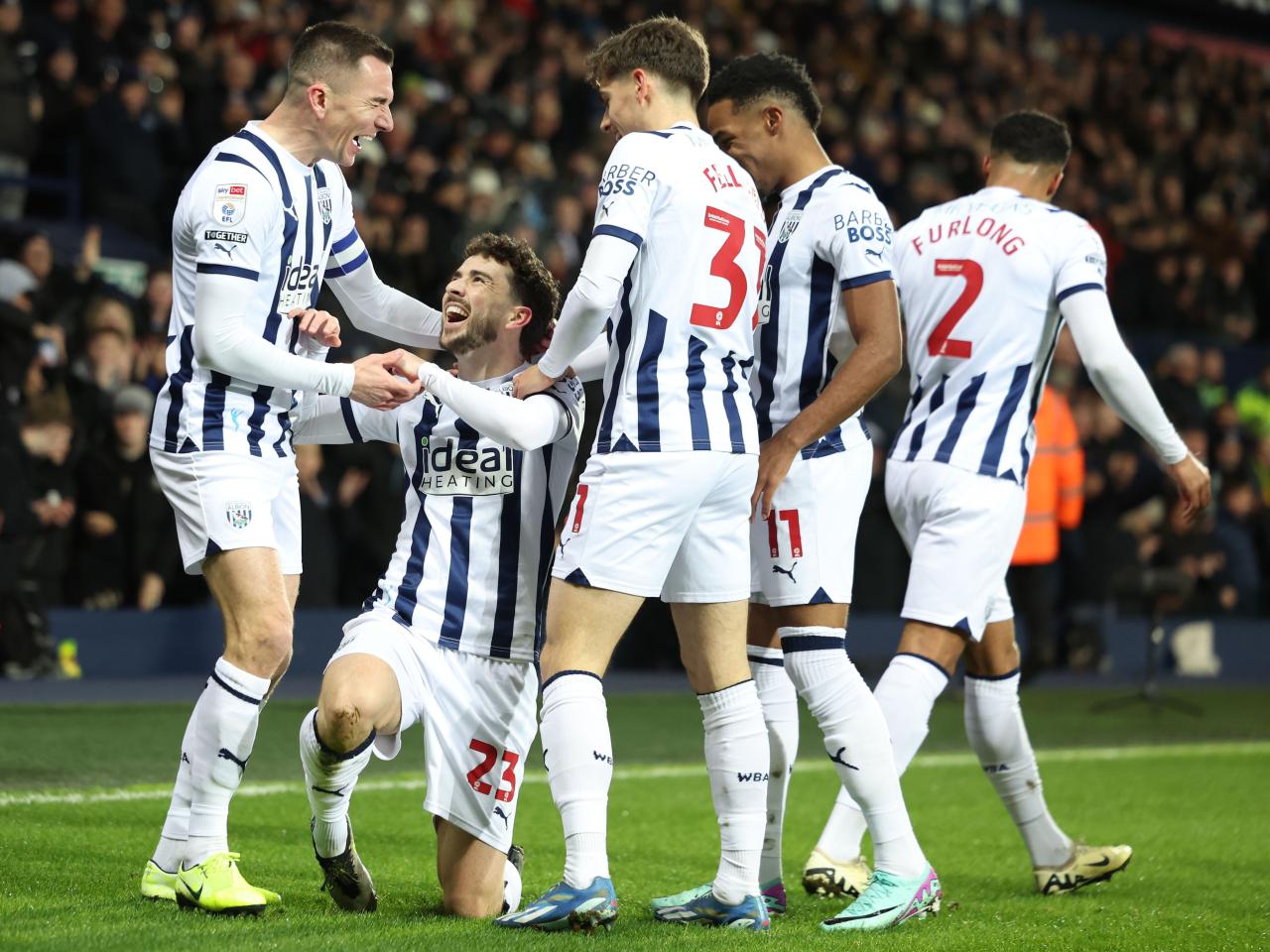 Mikey Johnston celebrates his goal against Coventry with several team-mates