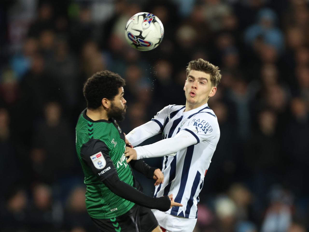 Tom Fellows jumping for the ball against Coventry 