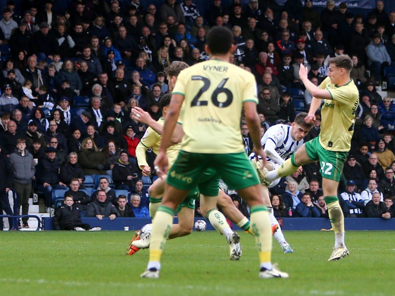 Tom Fellows shoots and scores against Bristol City