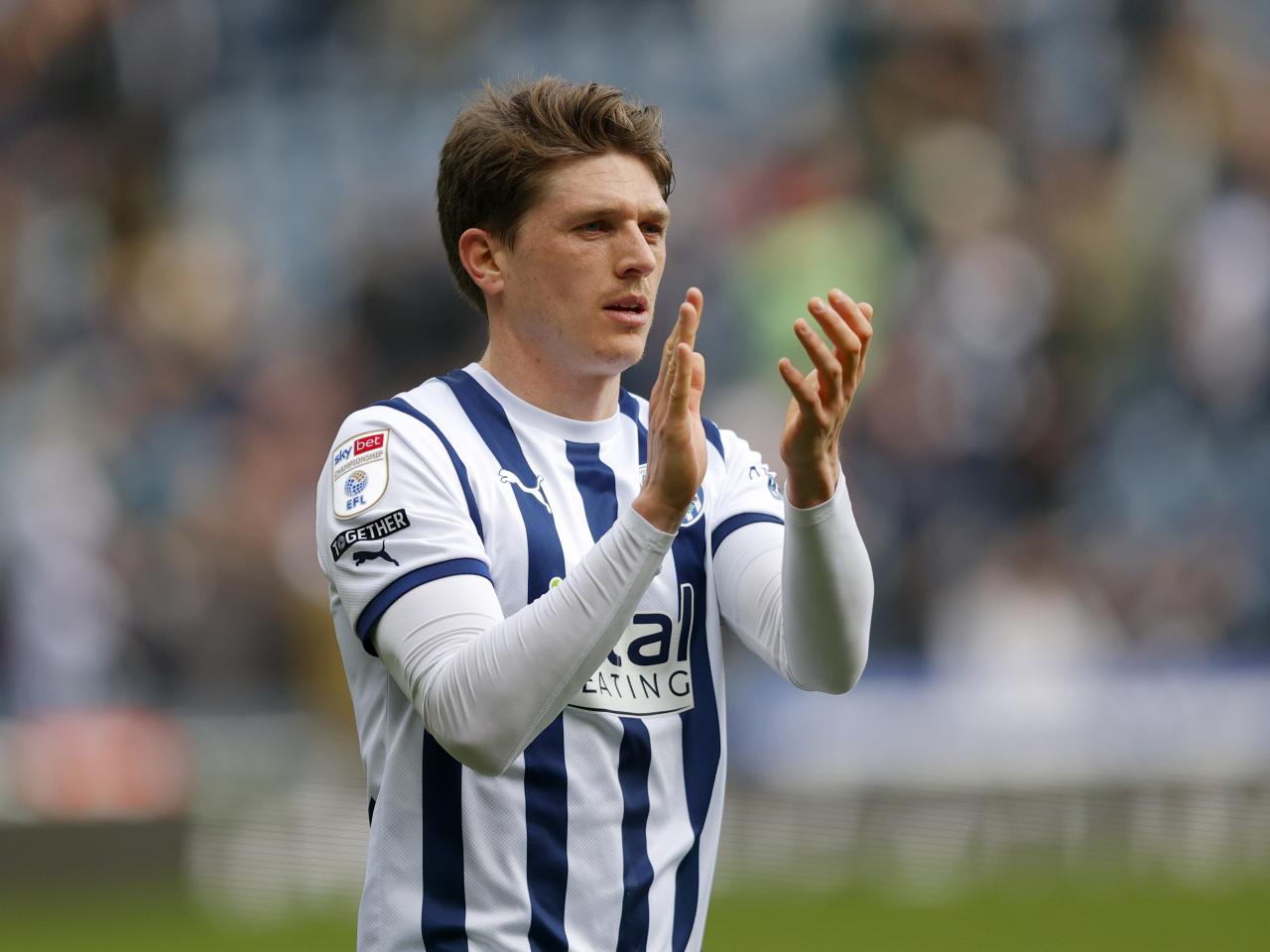 Adam Reach applauding supporters after the Watford game