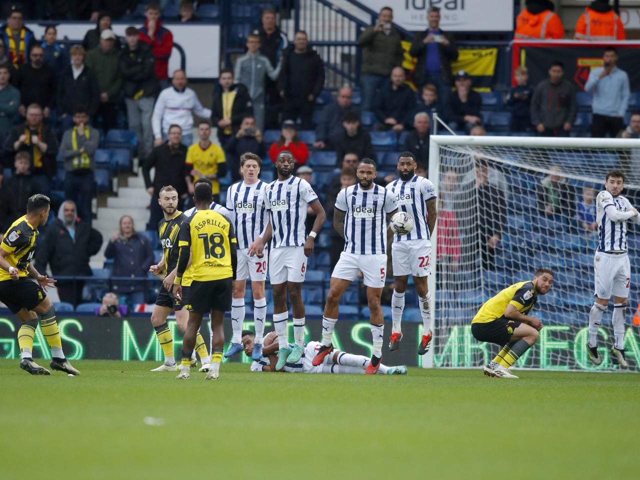Albion players in a wall trying to block a Watford free-kick 