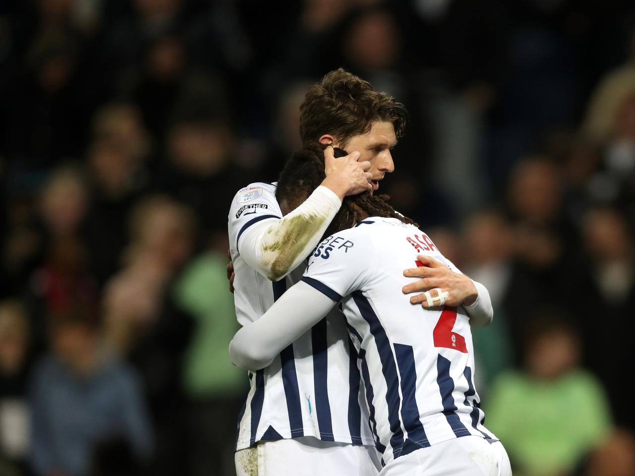 Brandon Thomas-Asante celebrates scoring against Rotherham at The Hawthorns with Adam Reach