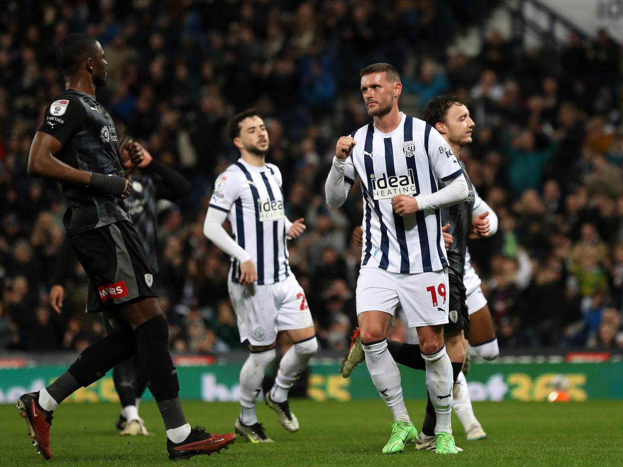 John Swift celebrates scoring a penalty against Rotherham United at The Hawthorns