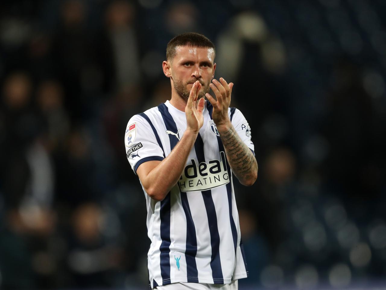John Swift applauding Albion fans after the Rotherham game