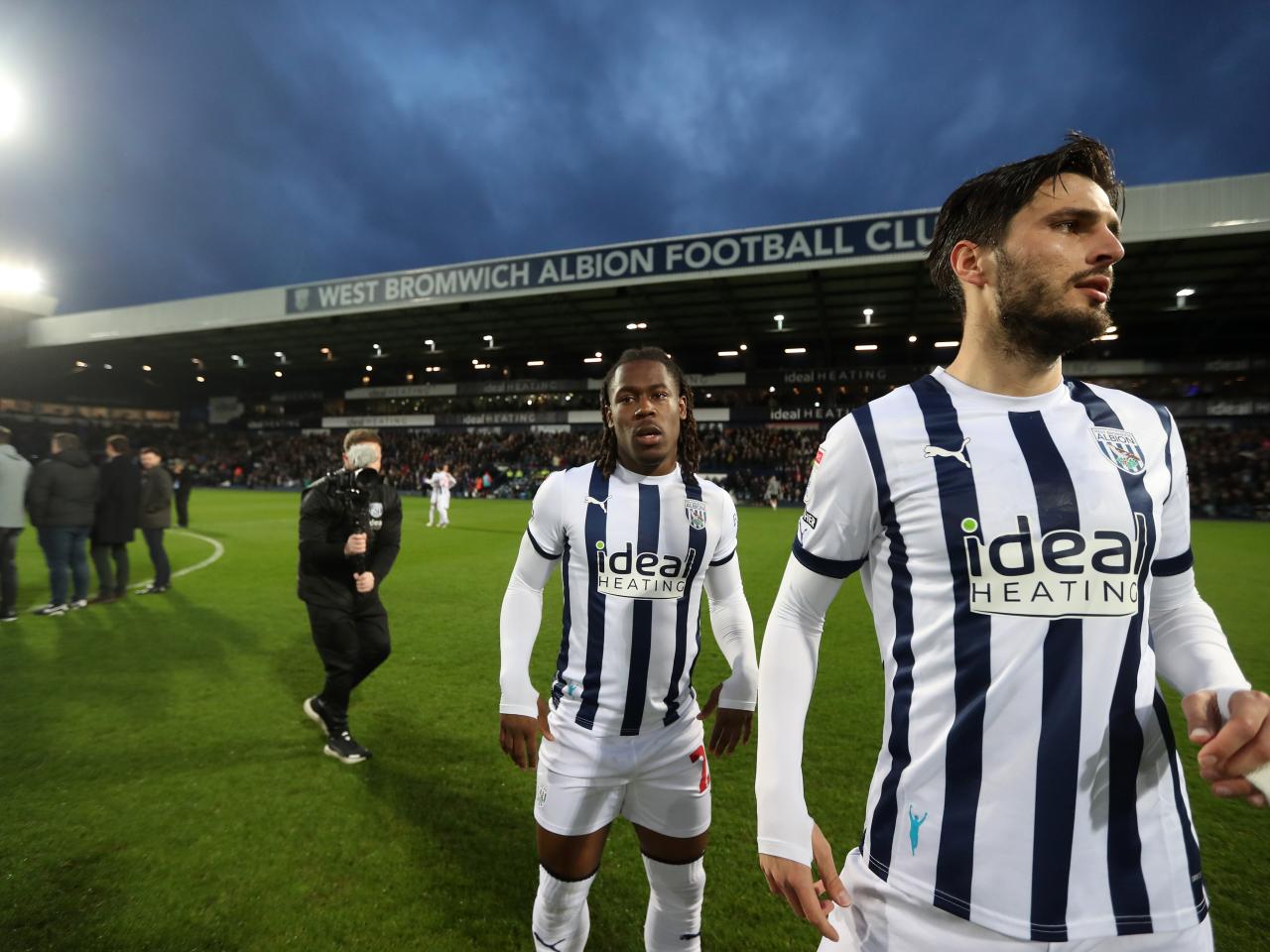 Okay Yokuslu and Brandon Thomas-Asante on the pitch before the Rotherham game
