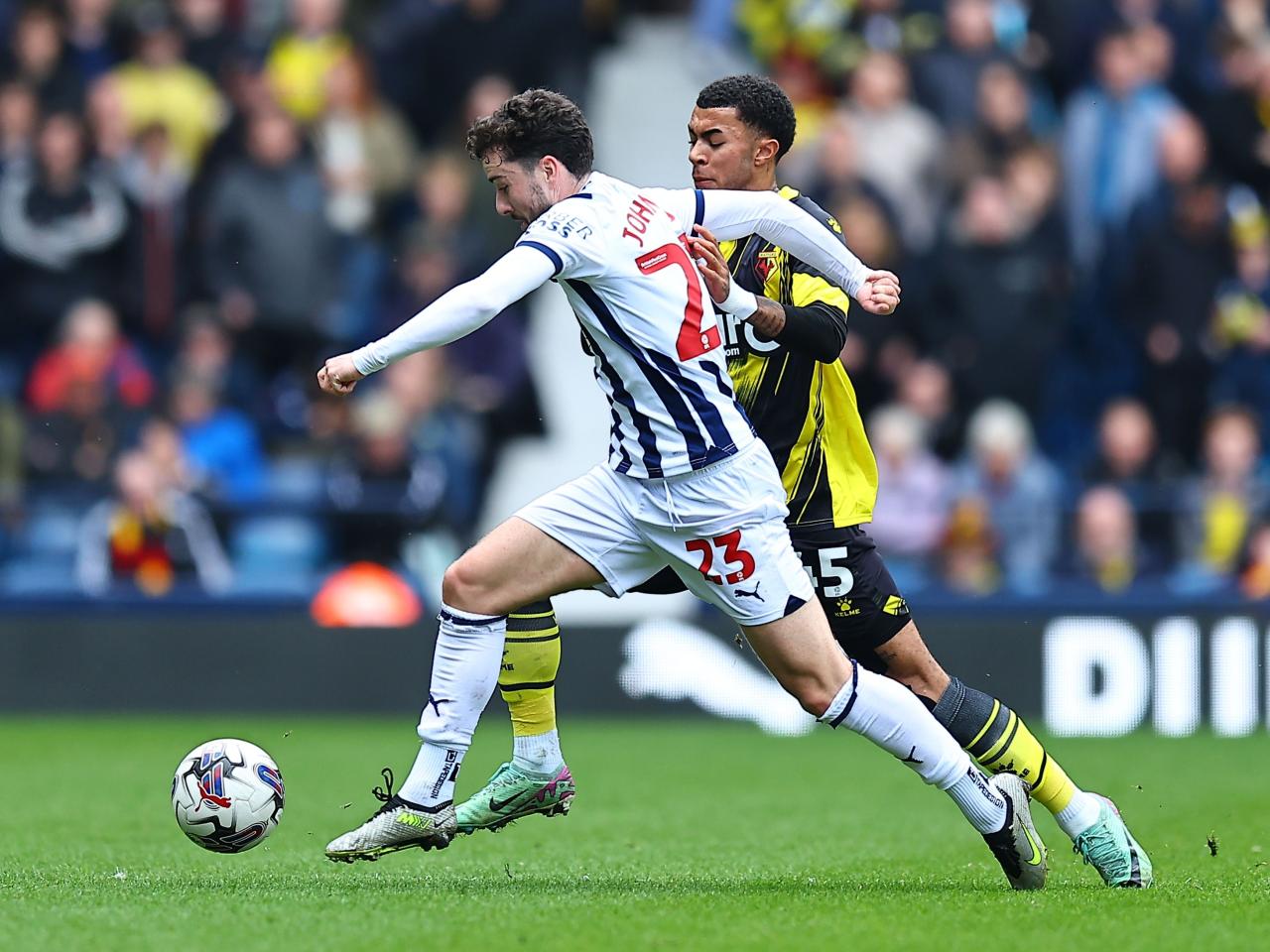 Mikey Johnston running with the ball against Watford 