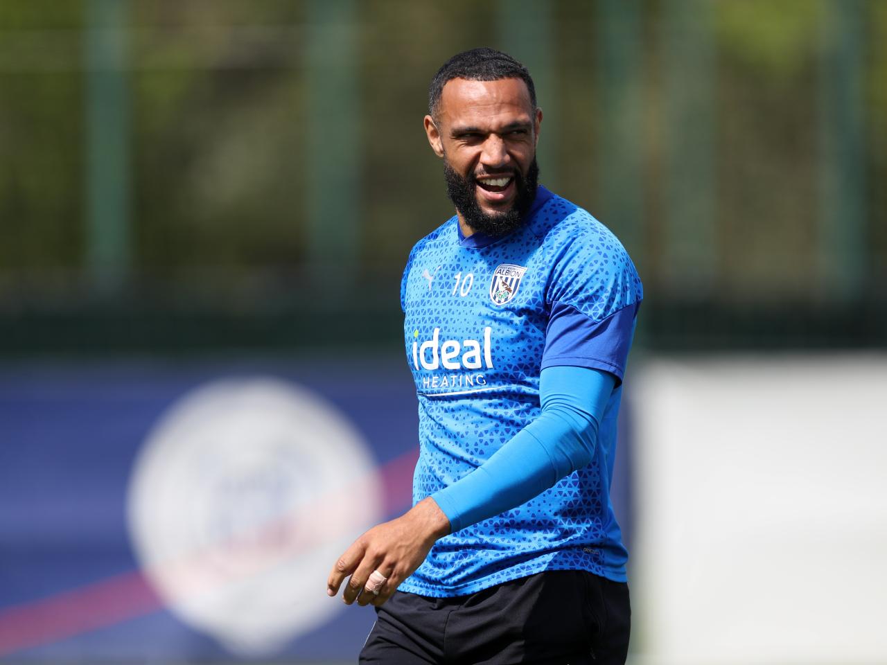 Matty Phillips smiling in training