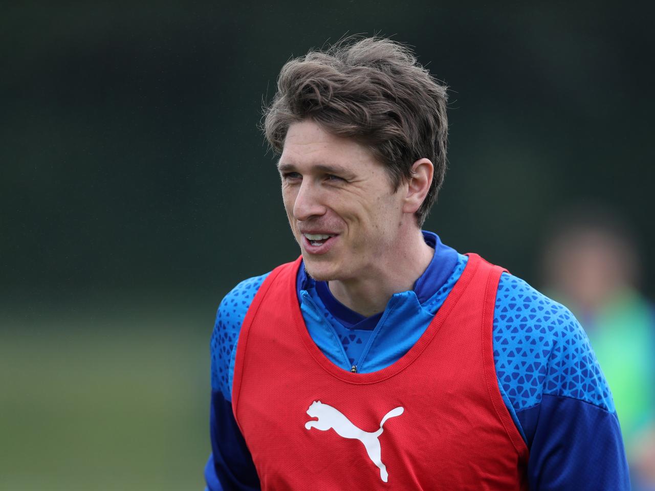 Adam Reach smiling during a training session
