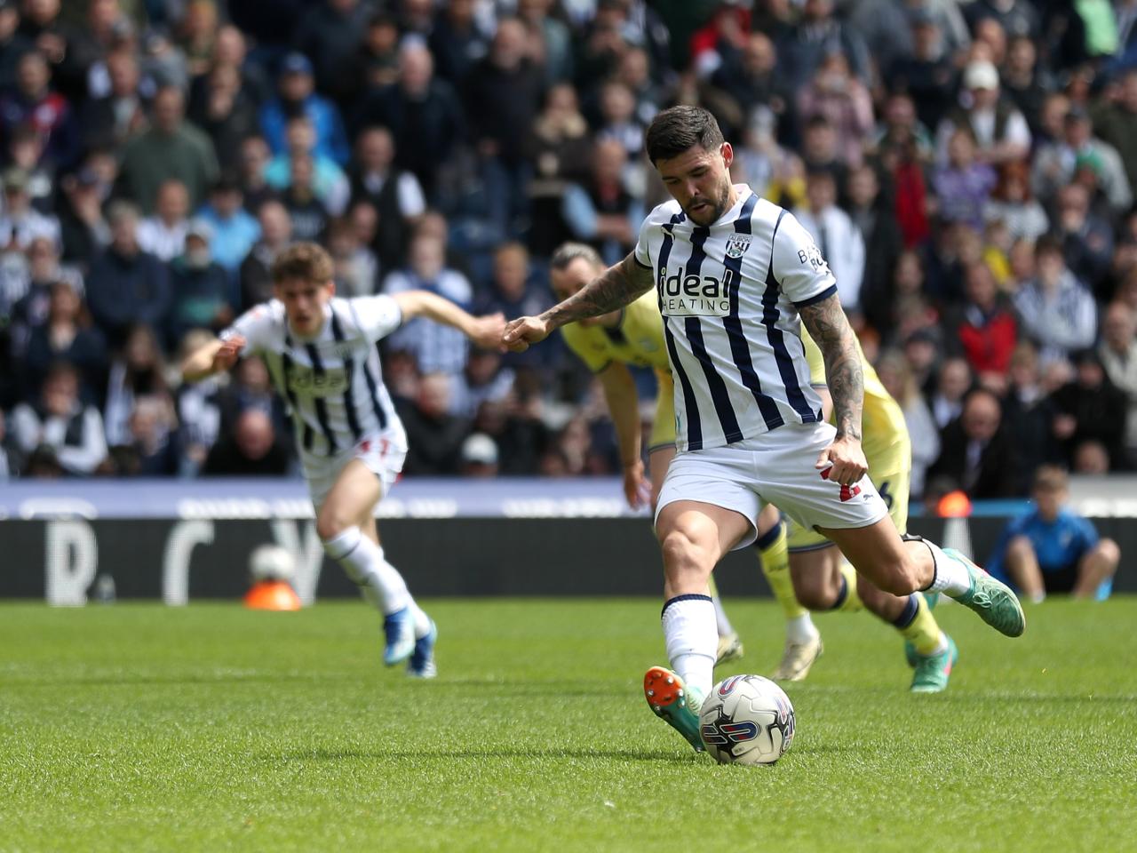 Alex Mowatt takes a penalty against Preston 