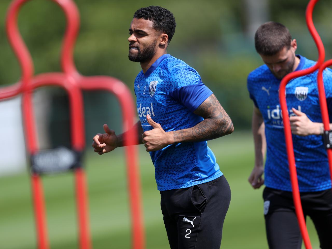 Darnell Furlong warming up before training 