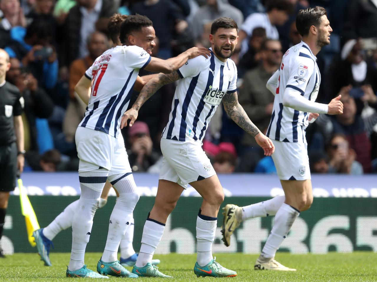 Alex Mowatt celebrates scoring a penalty against Preston with team-mates