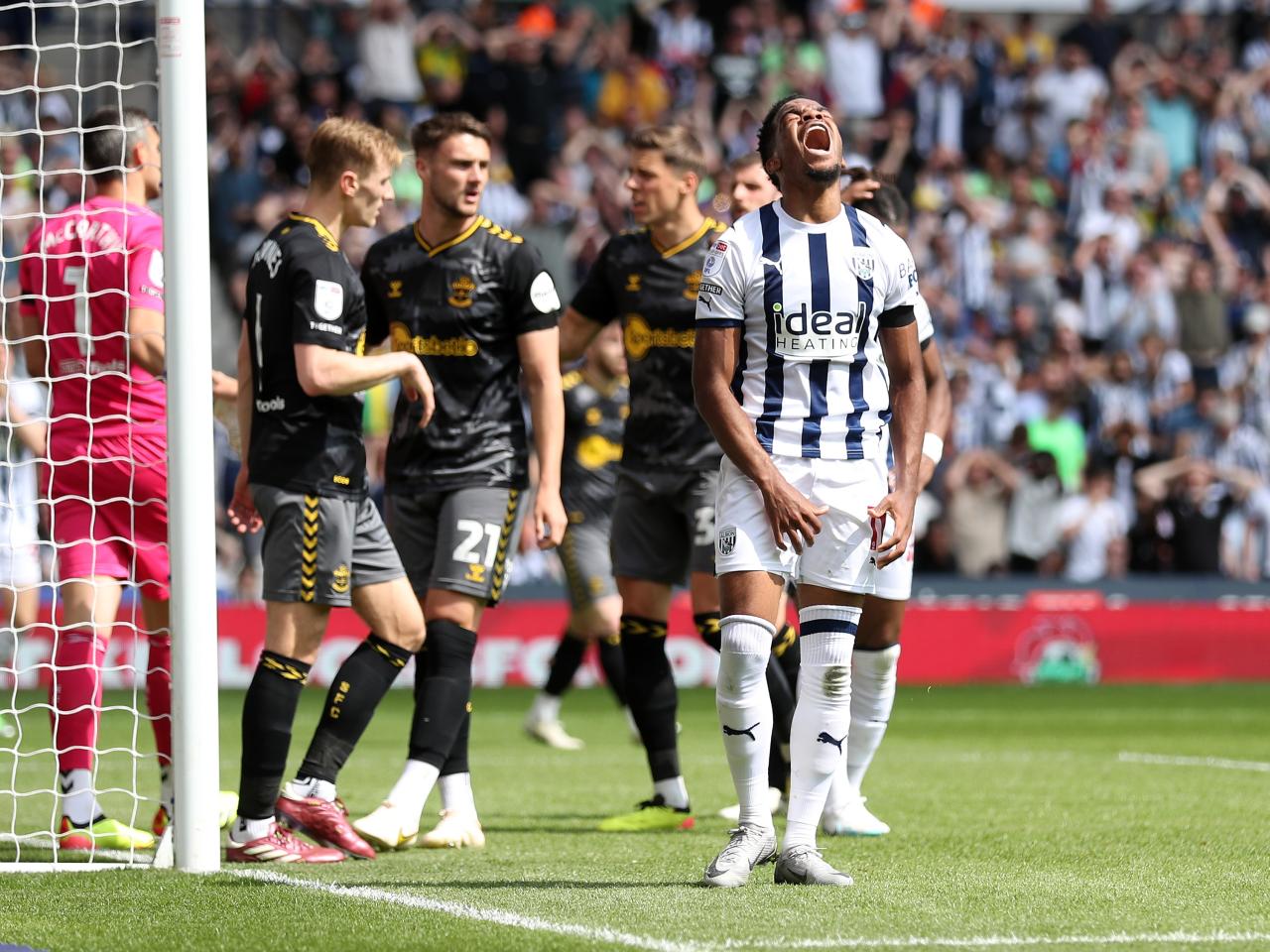 Grady Diangana looks frustrated as the Southampton goalkeeper saves his header at The Hawthorns 