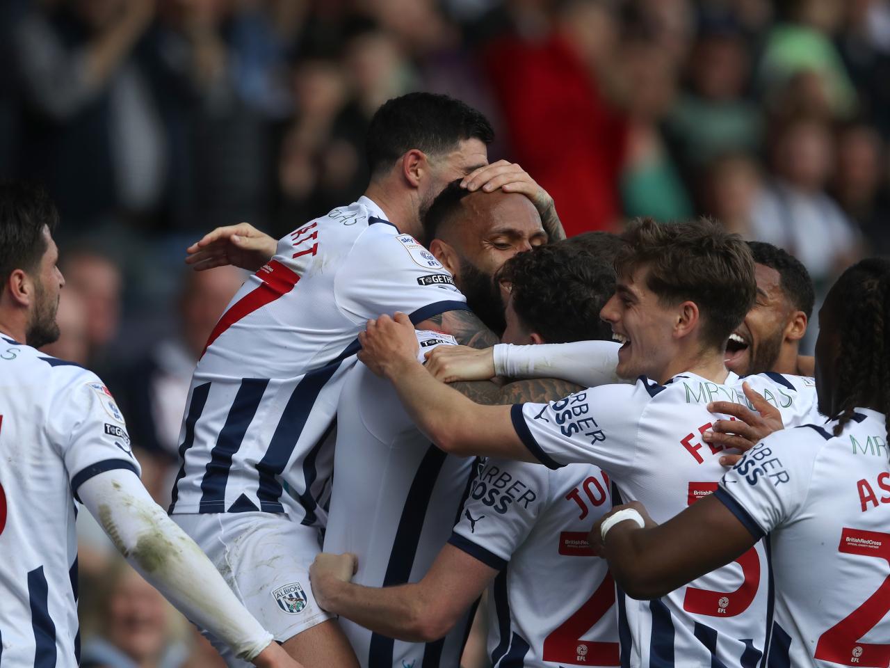 Kyle Bartley celebrates scoring against Preston with team-mates