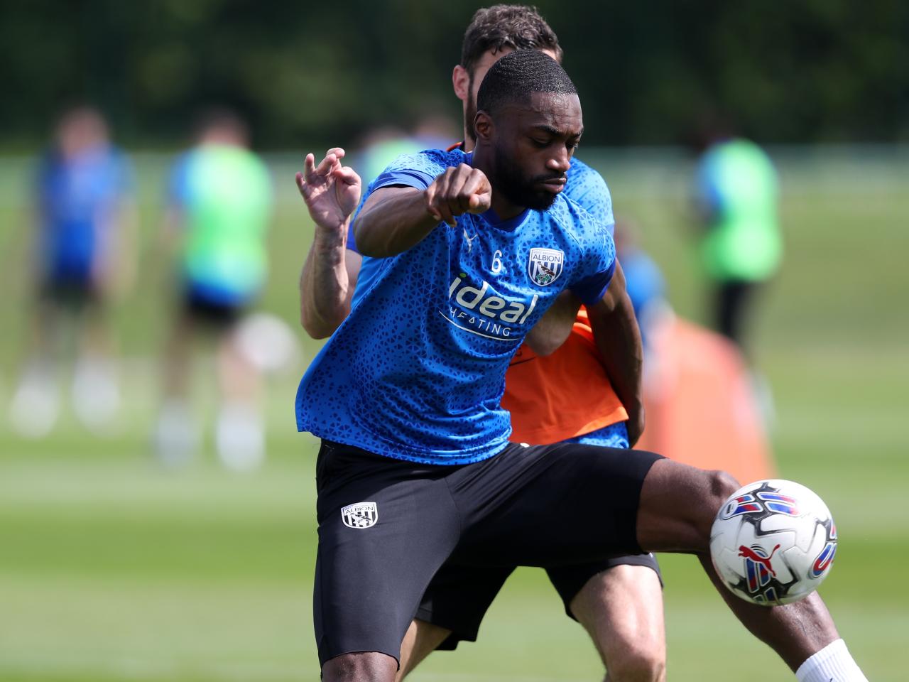 Semi Ajayi shielding the ball during training 