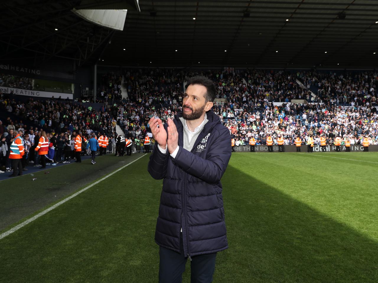 Carlos Corberán celebrates the win against Preston at full-time 