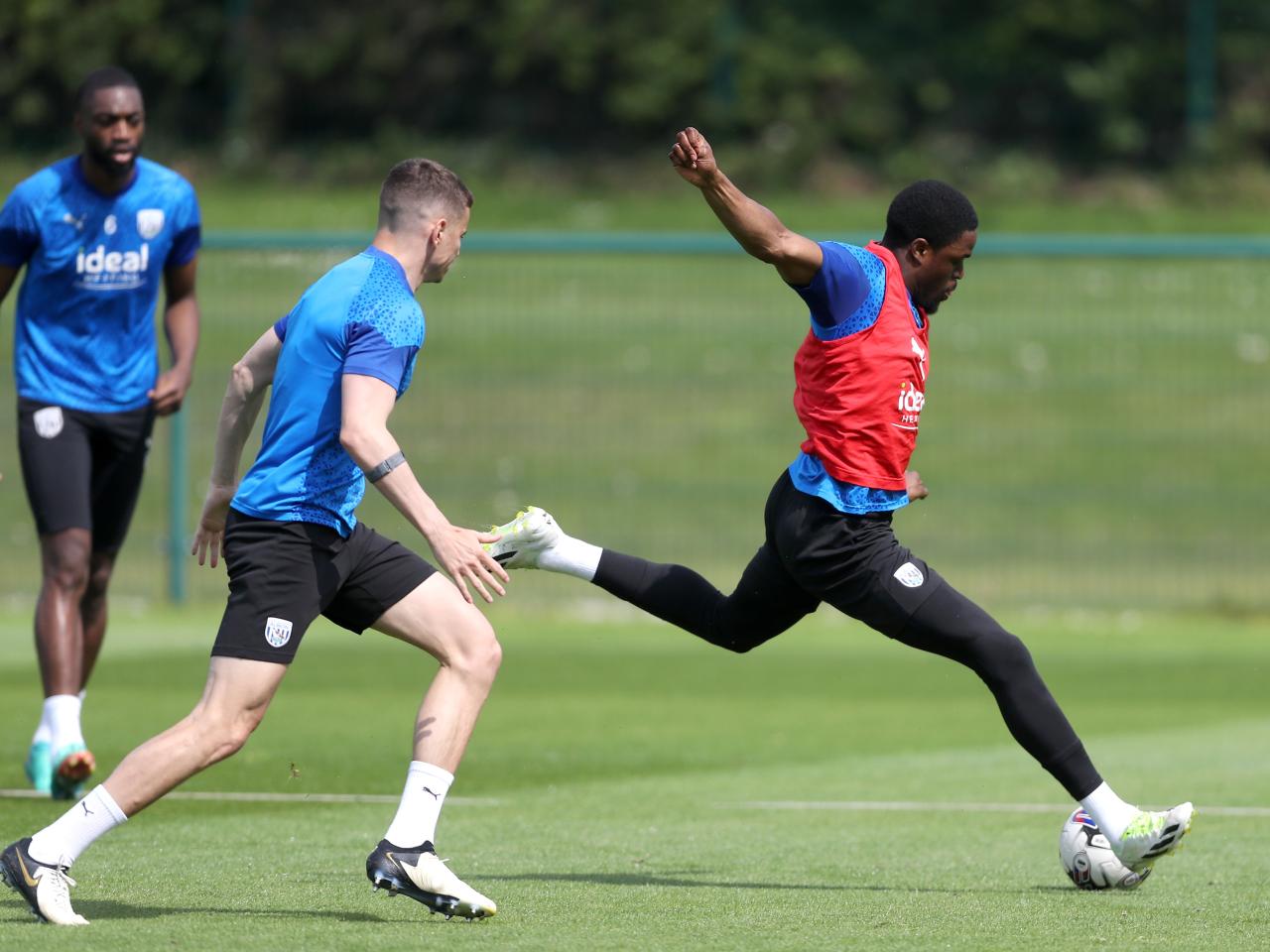 Grady Diangana striking the ball in training 