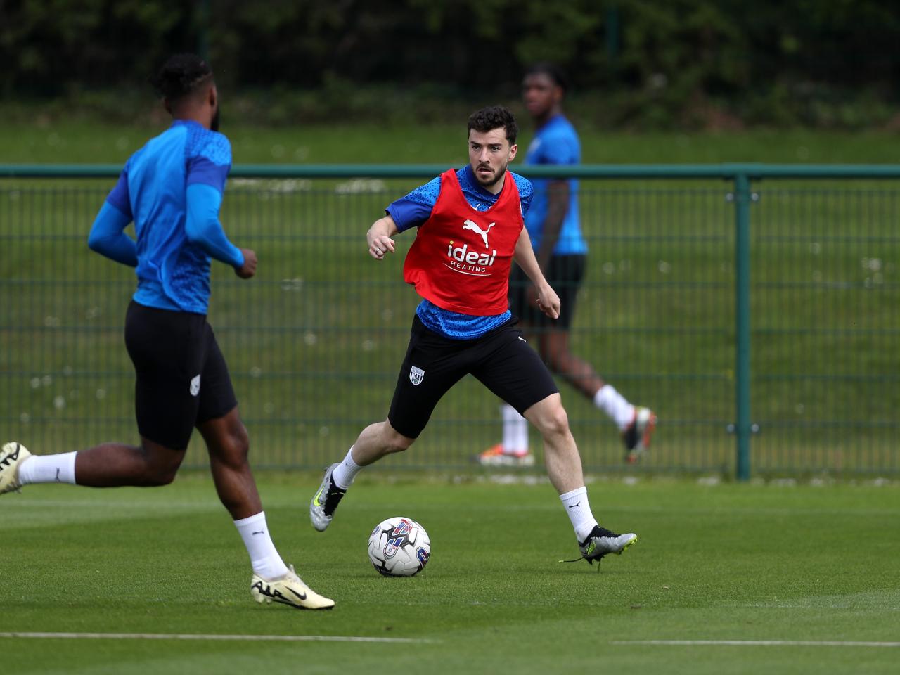 Mikey Johnston on the ball during training 