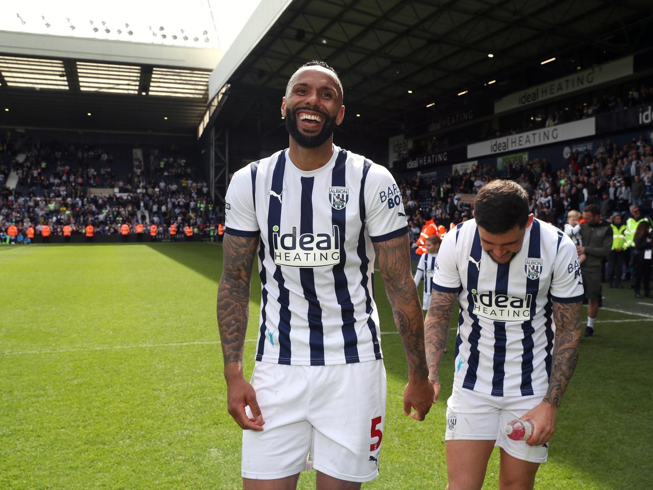 Kyle Bartley and Alex Mowatt celebrate the win against Preston at full-time 