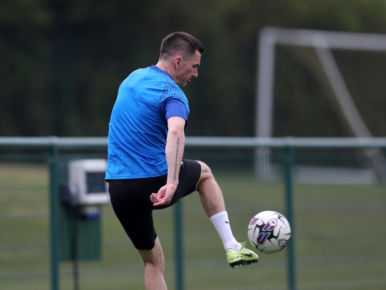 Jed Wallace controlling the ball during a training session