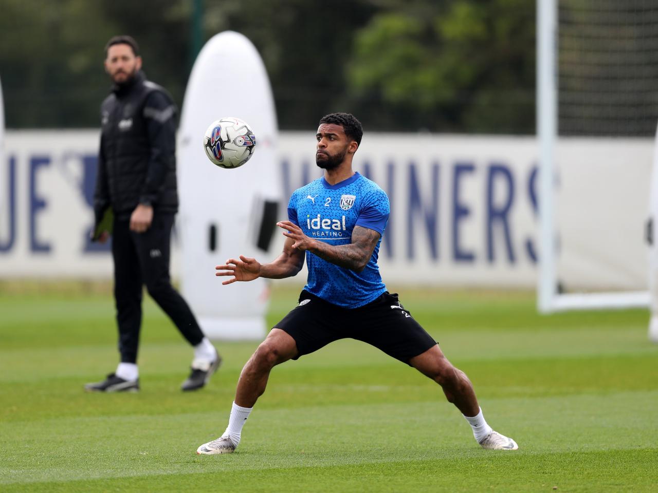 Darnell Furlong watching the ball during a training session 