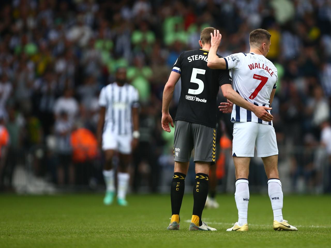 Jed Wallace and Jack Stephens embrace after the full-time whistle at The Hawthorns 