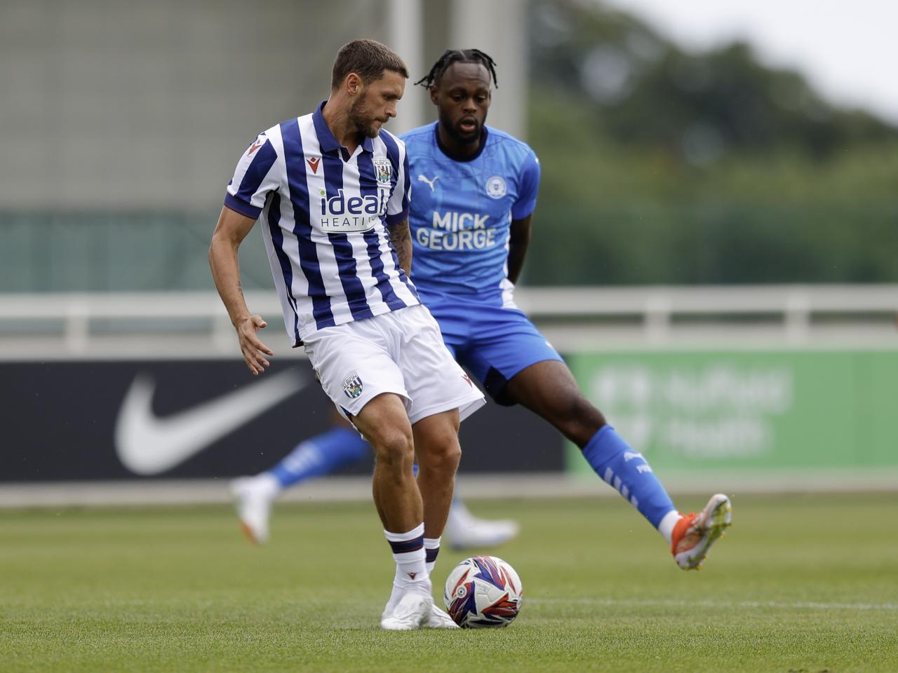 An image of John Swift on the ball during Albion's friendly against Peterborough