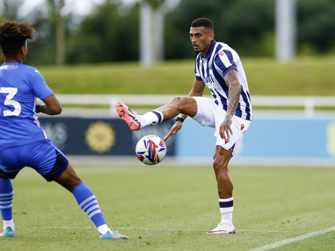 An image of Karlan Grant on the ball during Albion's friendly against Peterborough