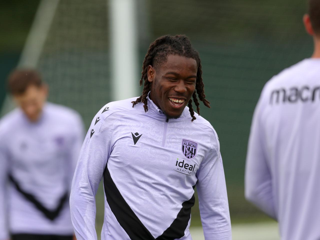 Brandon Thomas-Asante smiling during a training session