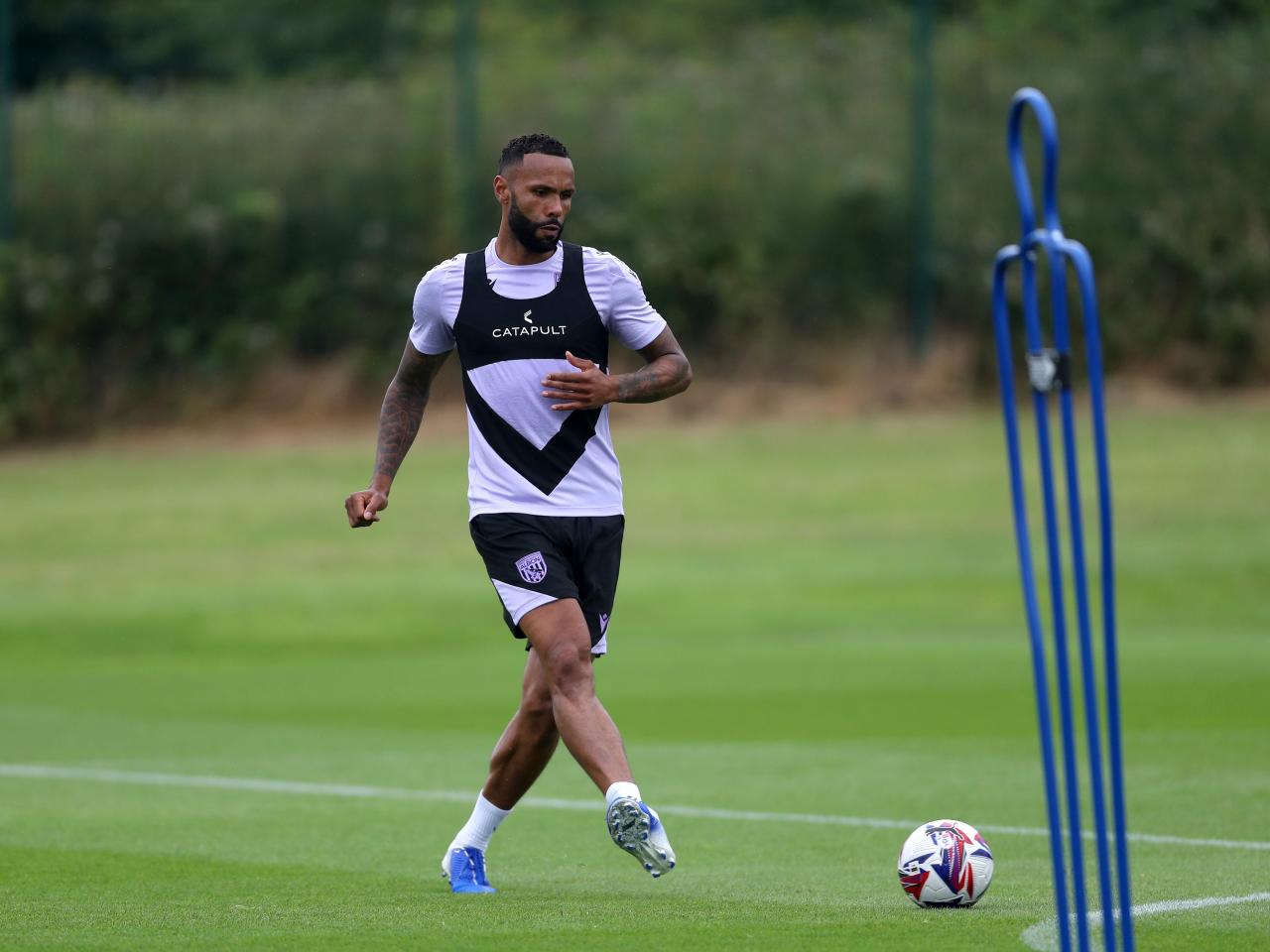 Kyle Bartley passing the ball during a training session