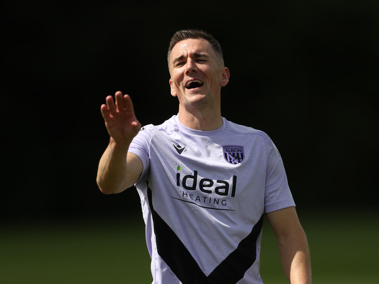 Jed Wallace laughing during a training session