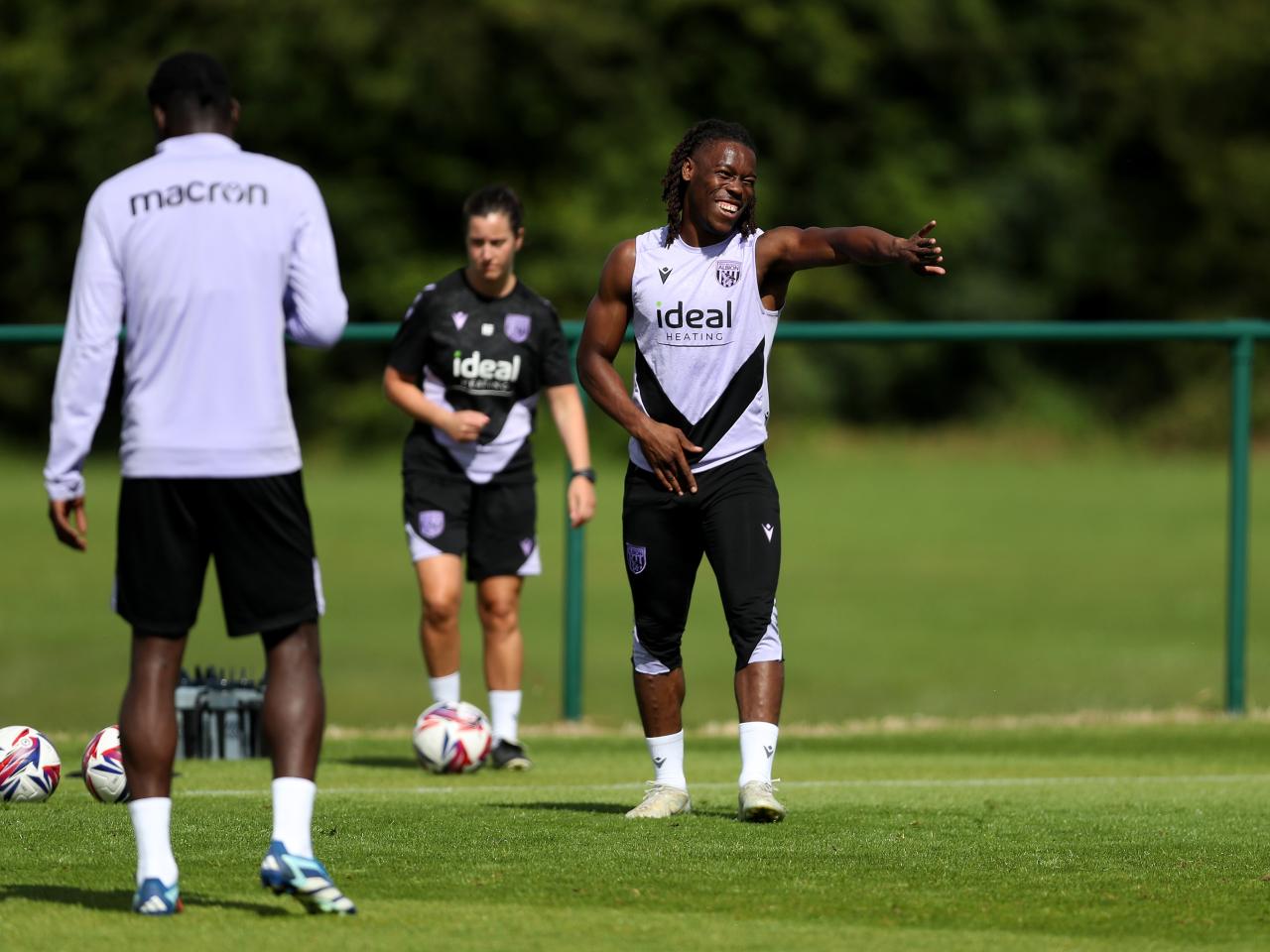 Brandon Thomas-Asante laughing during a training session