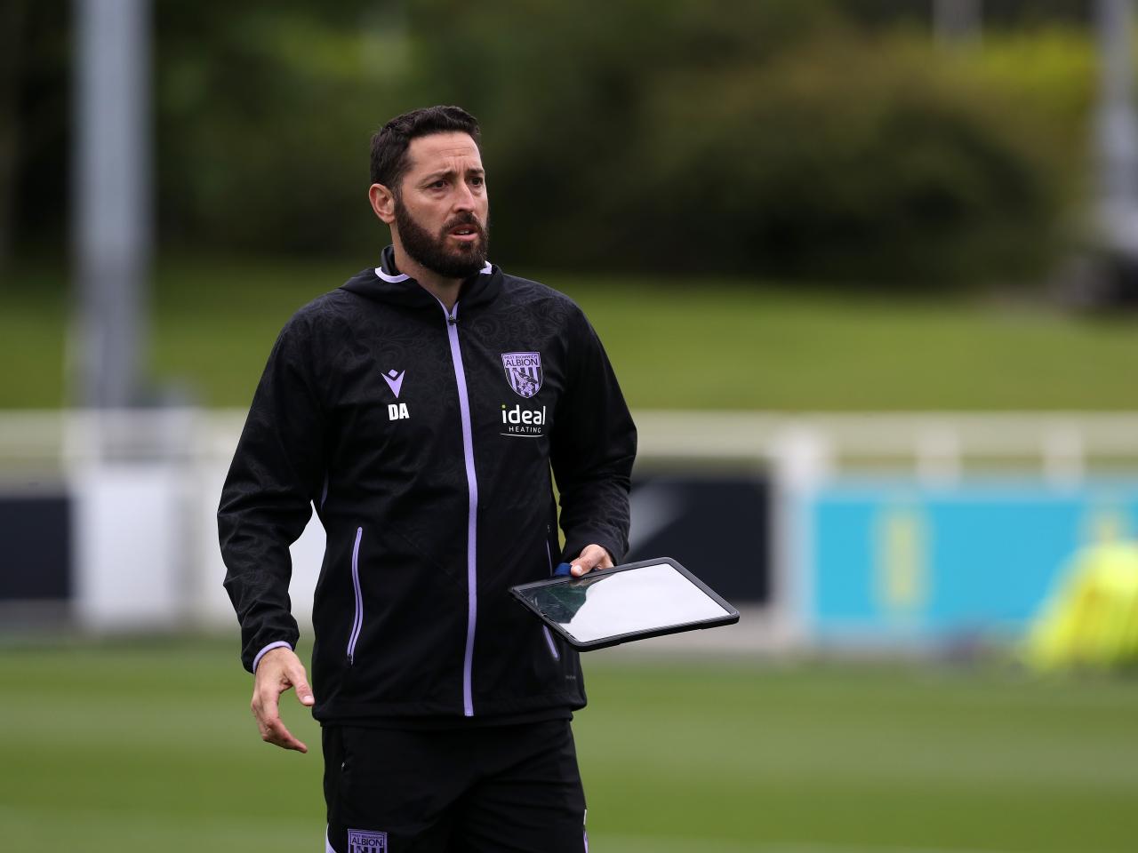 Coach Damia Abella out on the training pitch at St. George's Park