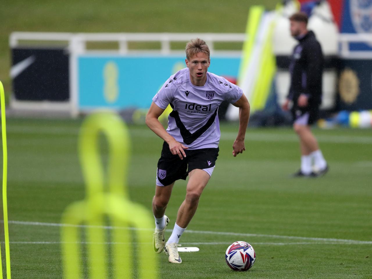 Torbjørn Heggem on the ball during a training session at St. George's Park
