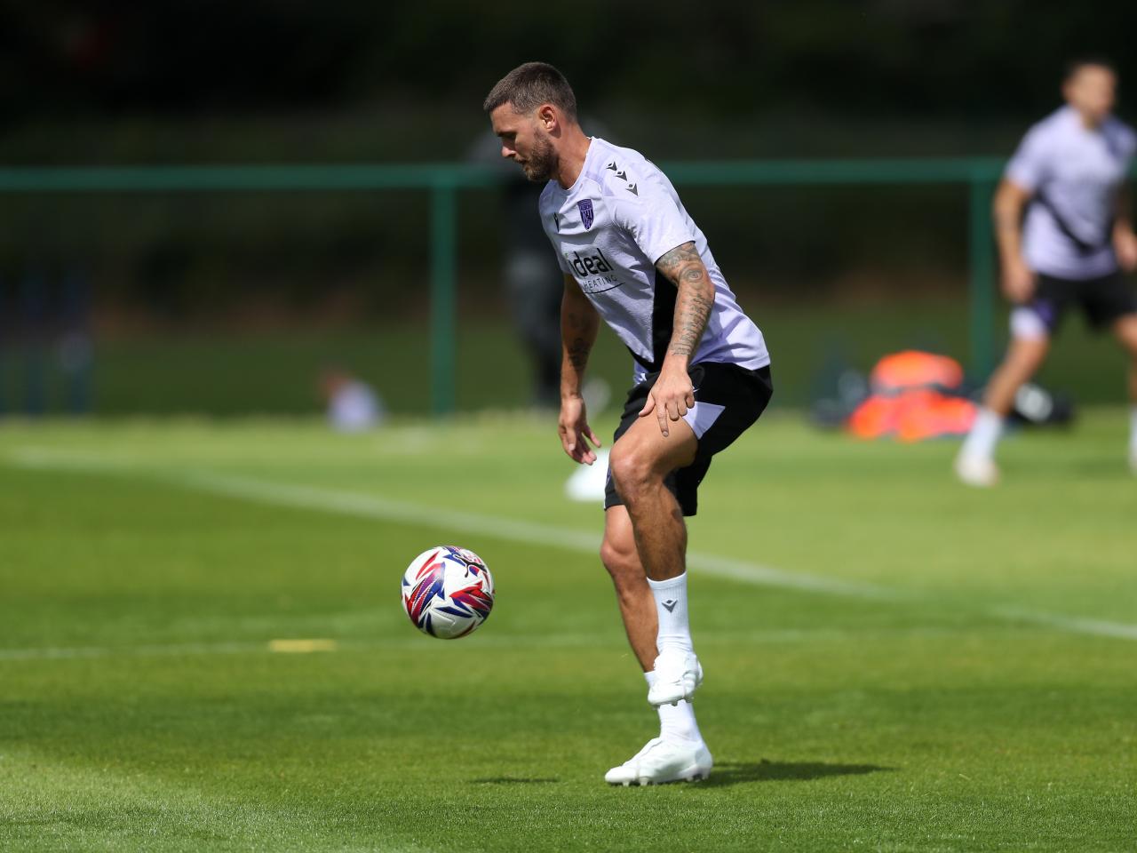 John Swift on the ball during training 