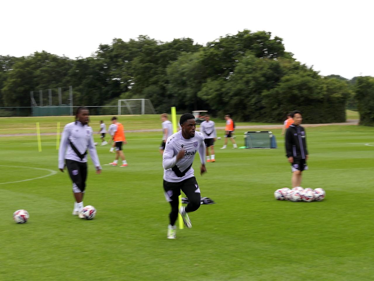 Josh Maja running forwards during a training session 