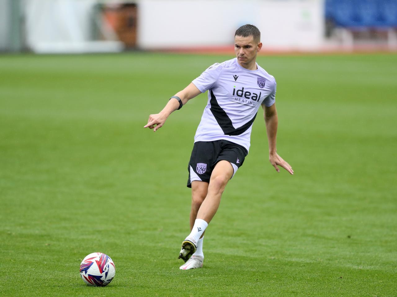 Conor Townsend on the ball during a training session at St. George's Park