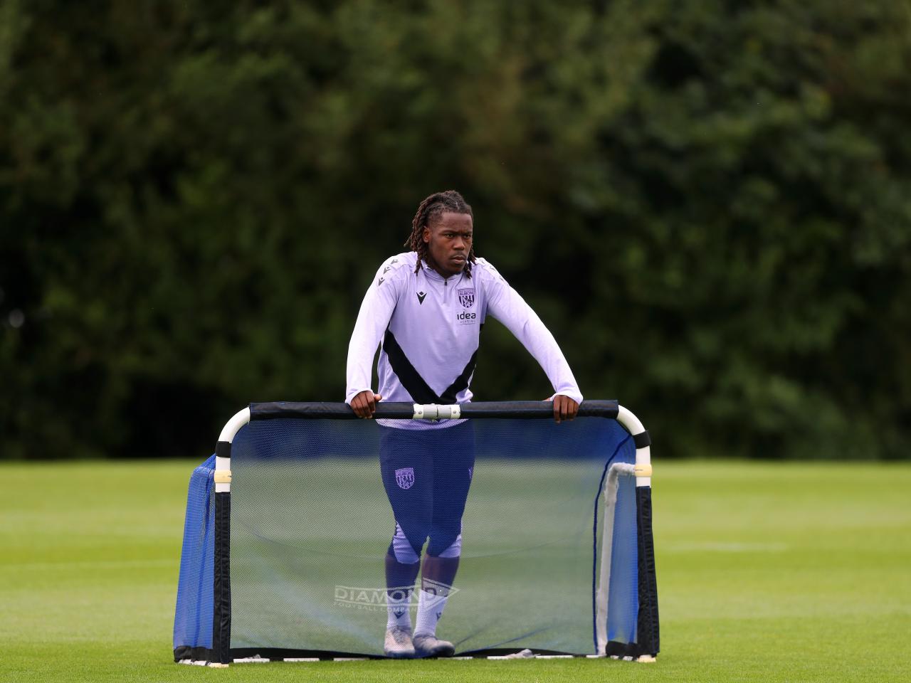 Brandon Thomas-Asante stood by a mini goal during a training session