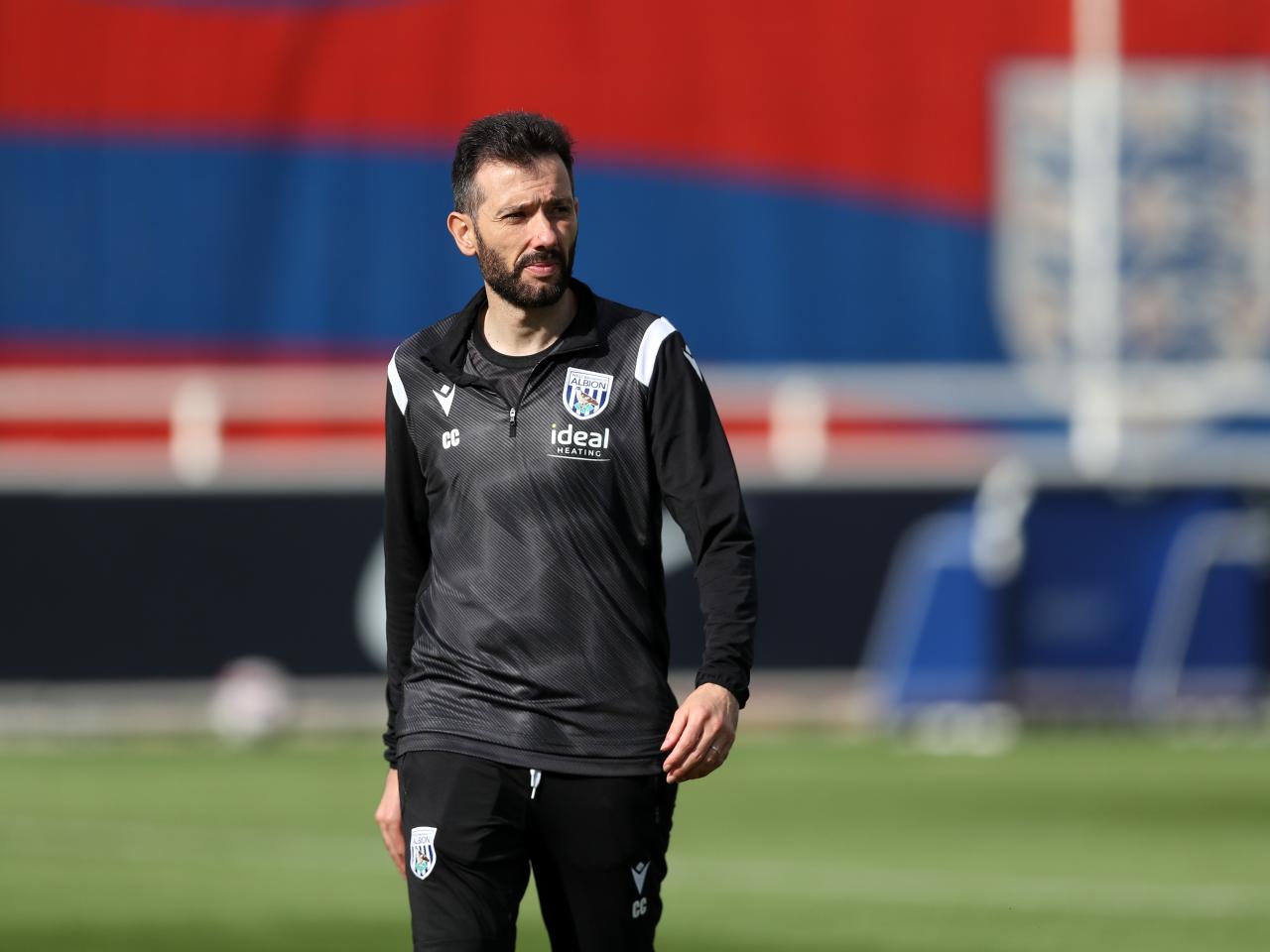 Carlos Corberán out on the training pitch at St. George's Park
