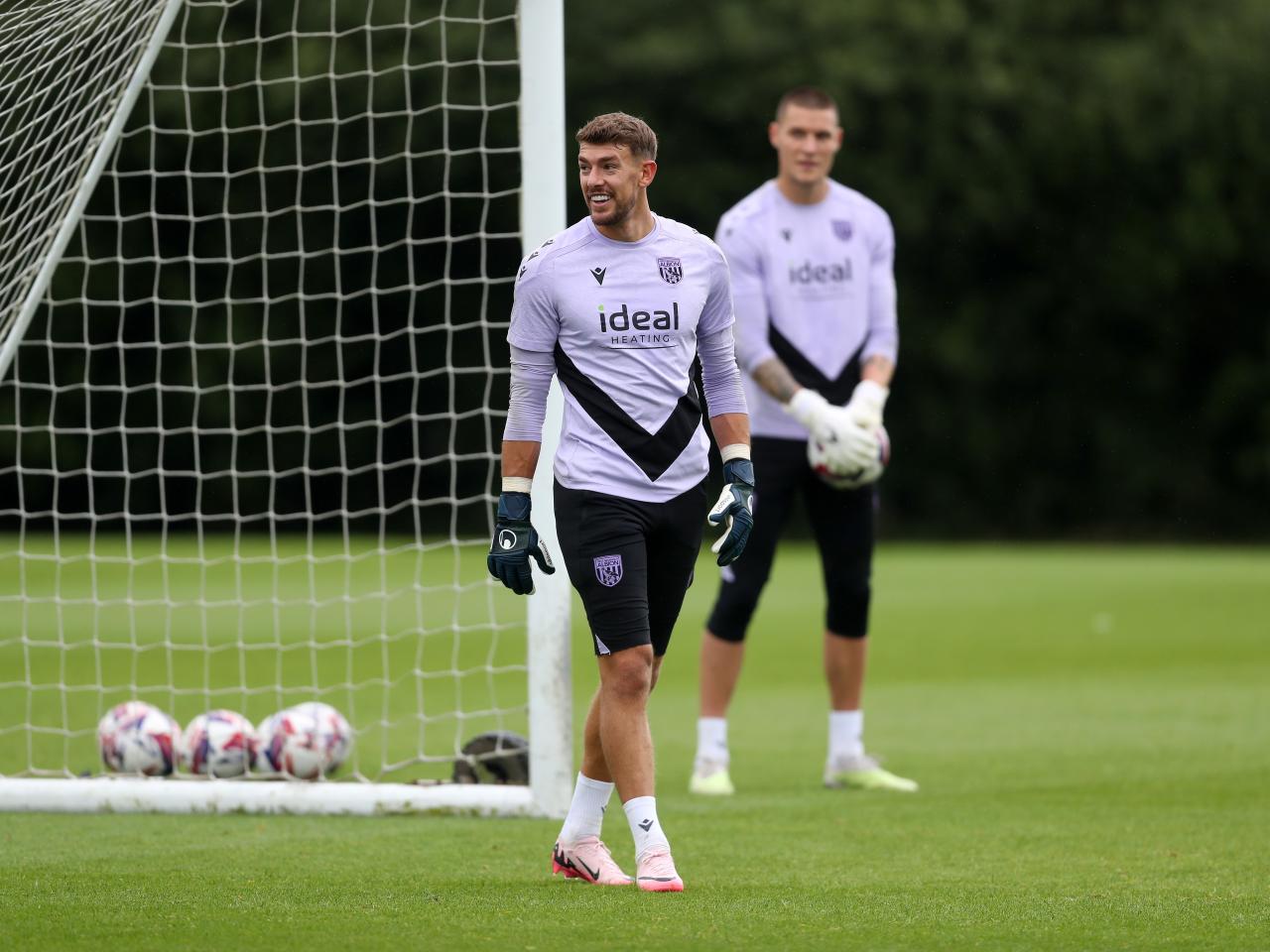 Alex Palmer smiling during a training session