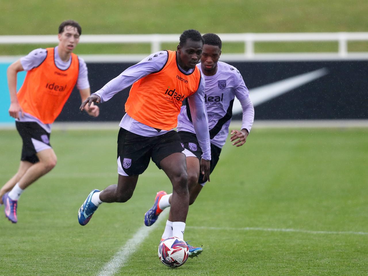 Ousmane Diakité on the ball during a training session at St. George's Park