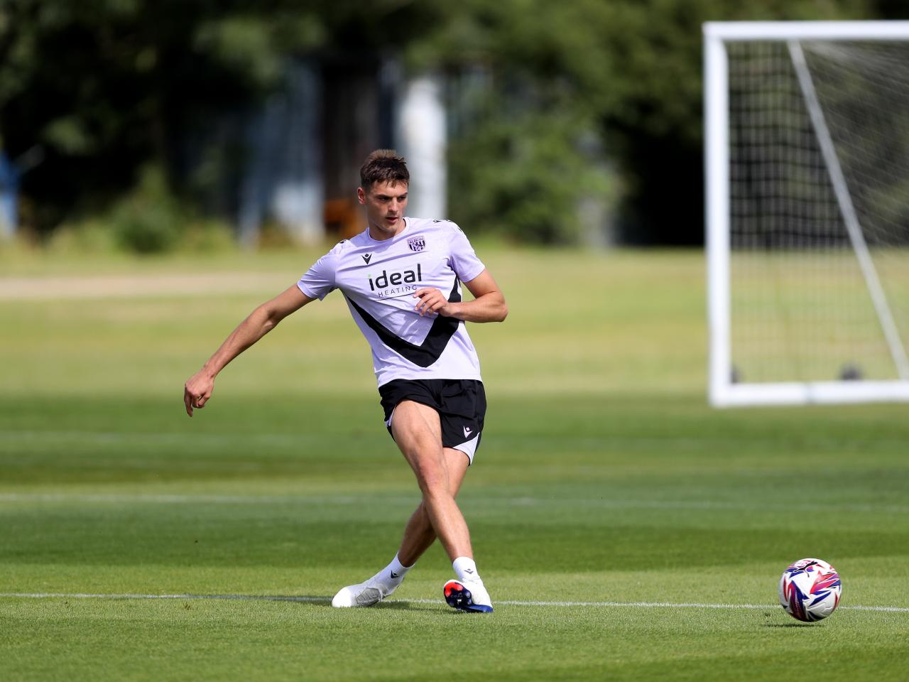 Caleb Taylor on the ball during training 