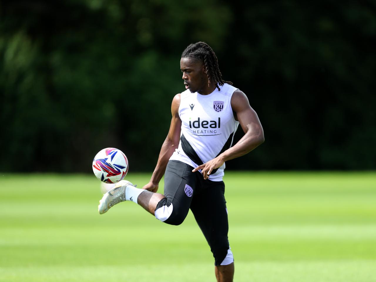 Brandon Thomas-Asante on the ball during training 