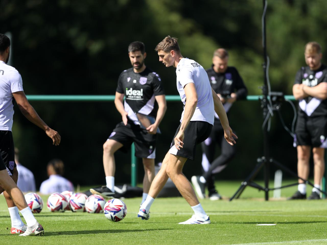 Caleb Taylor on the ball during training 