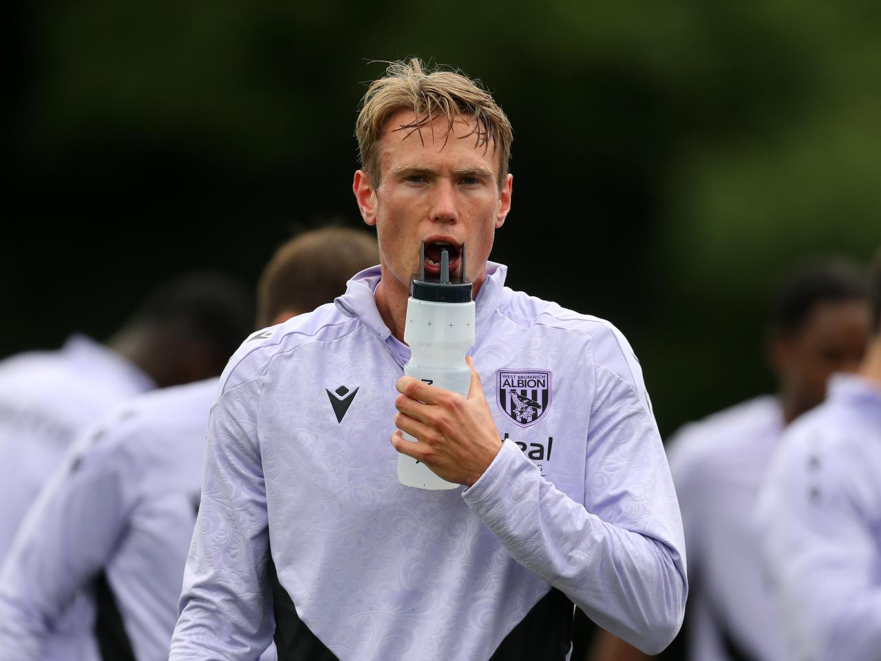 Torbjørn Heggem drinking water during a pause in training 